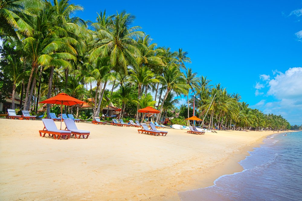 chairs and umbrellas on the beach n Koh Samui