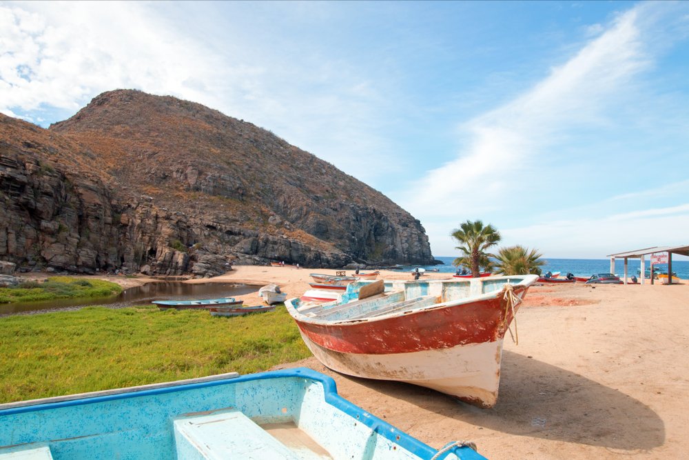 boat on the beach in Playa Todos Santos, Mexico