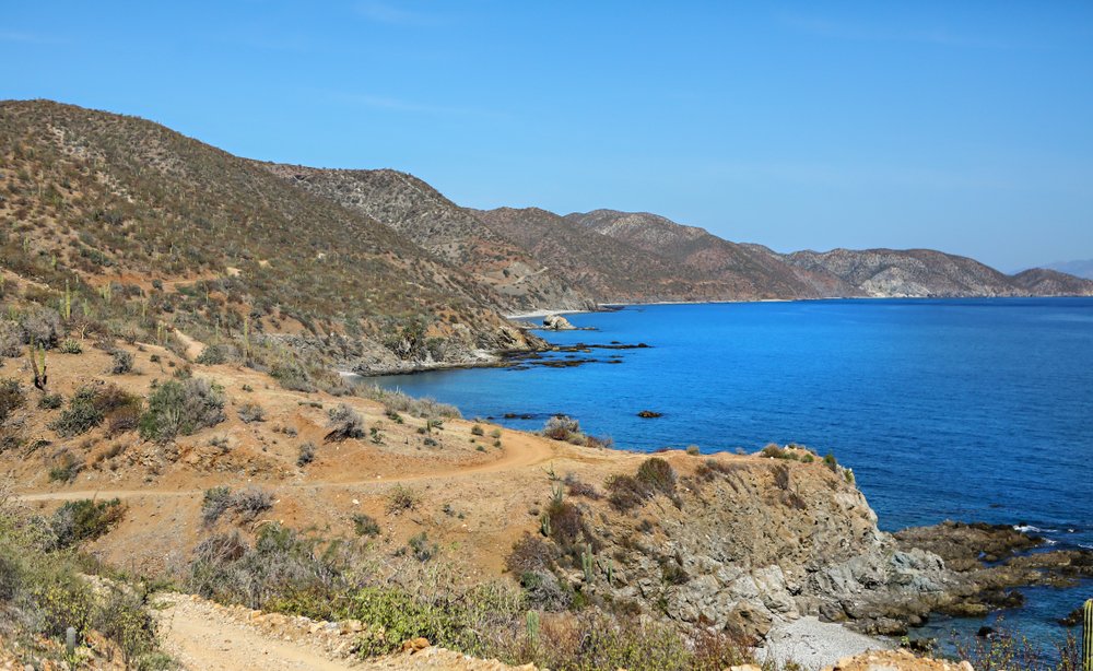 dry hills and beach in the coast of Playa Todos Santos, Mexico