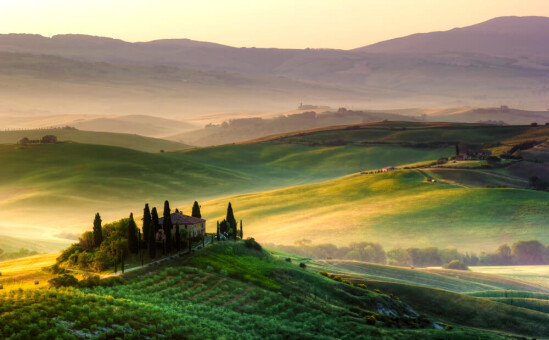 sunrise over rolling hills of Tuscany